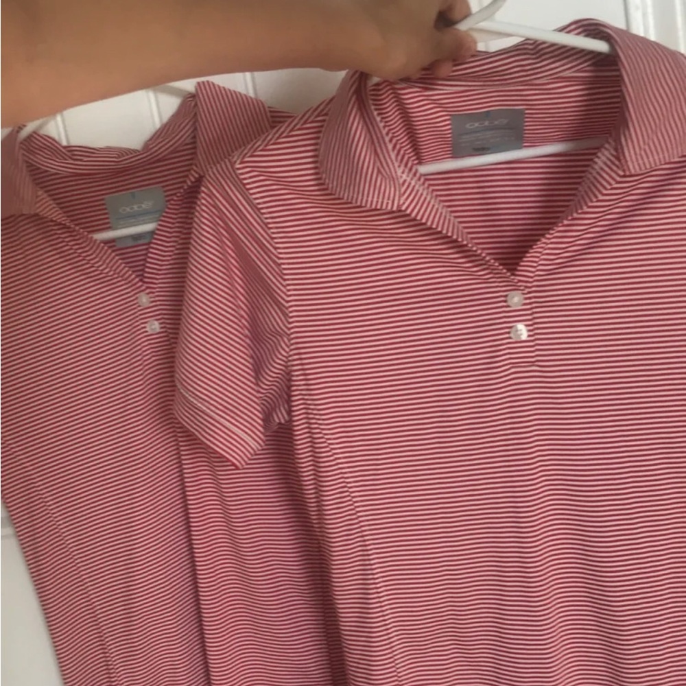 Two Oobe Hydrochill red and white striped short sleeve polo shirt. Small
